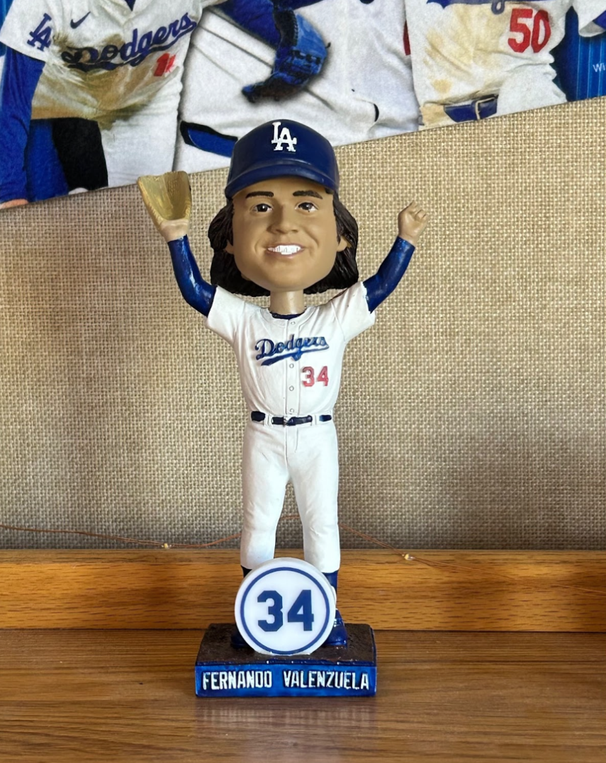 Fernando Valenzuela bobblehead on the top shelf in the writer's dorm